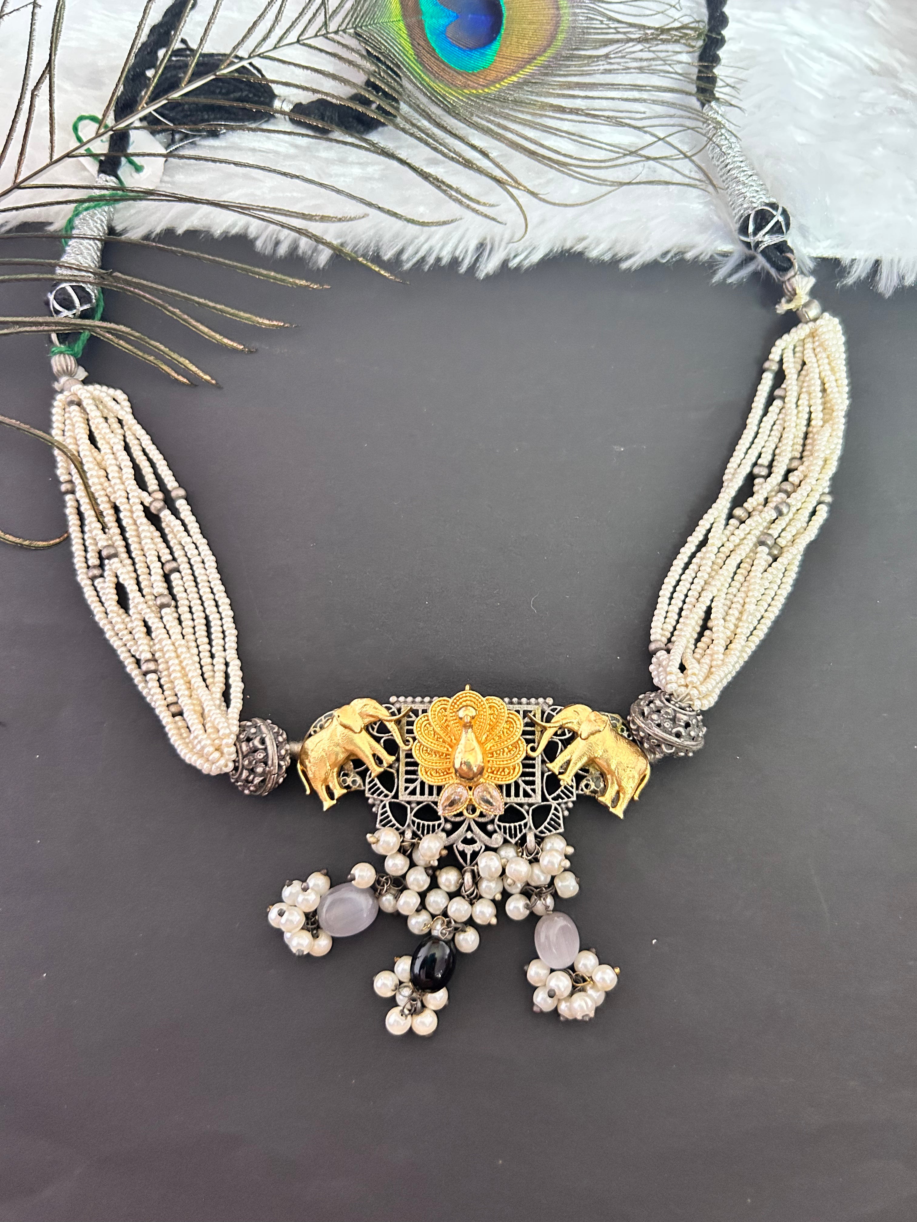 Manka Elephant motive dual tone necklace